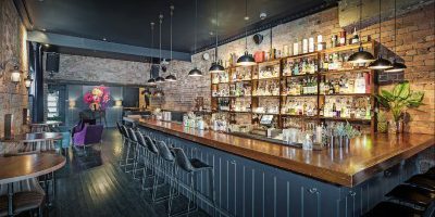 Exclusive Bar - Warmly lit nook with Rustic-chic Decor at The Collection Bar